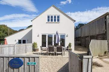 The Parlour is the largest of a group of three cottages at this coastal Dorset Farm, the front door is around the right side of the cottage.
