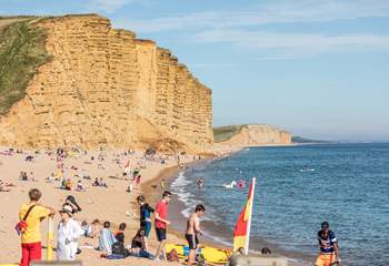 Visit West Bay with it's sandy cliffs.  It's the 'home' of Broadchurch.