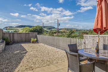 Enjoy eating outside on this fabulous patio, with views right across to Golden Cap.