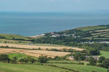 The three cottages at Doghouse Farm are the cluster of buildings in the bottom right of this photograph.