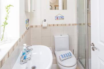 The shower-room is bright and cheerful.