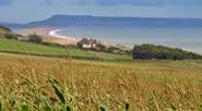 Travel east along the scenic coast road to Weymouth and Portland, with extraordinary views of Chesil beach.