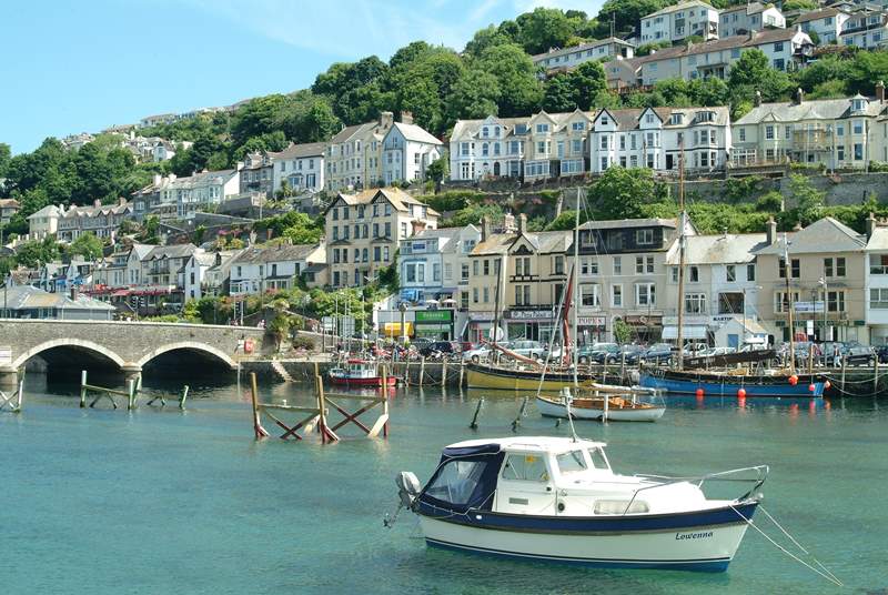 Boats in the harbour at nearby Looe, from where you can book fishing trips.