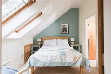 The bedroom...take care with the sloping ceiling on one side of the bed.