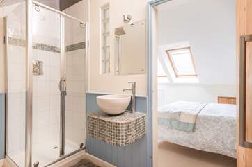 Looking from the shower-room into the bedroom.