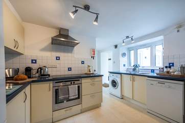 The kitchen leads to the two bedrooms.