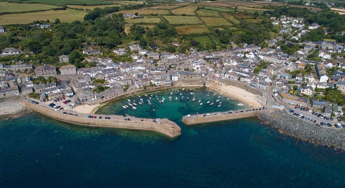 The pretty village of Mousehole is a short drive away.