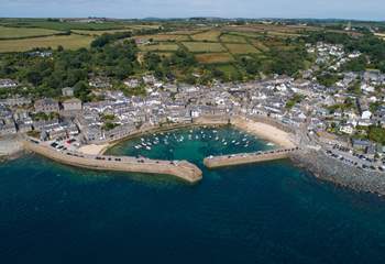 The pretty village of Mousehole is a short drive away.