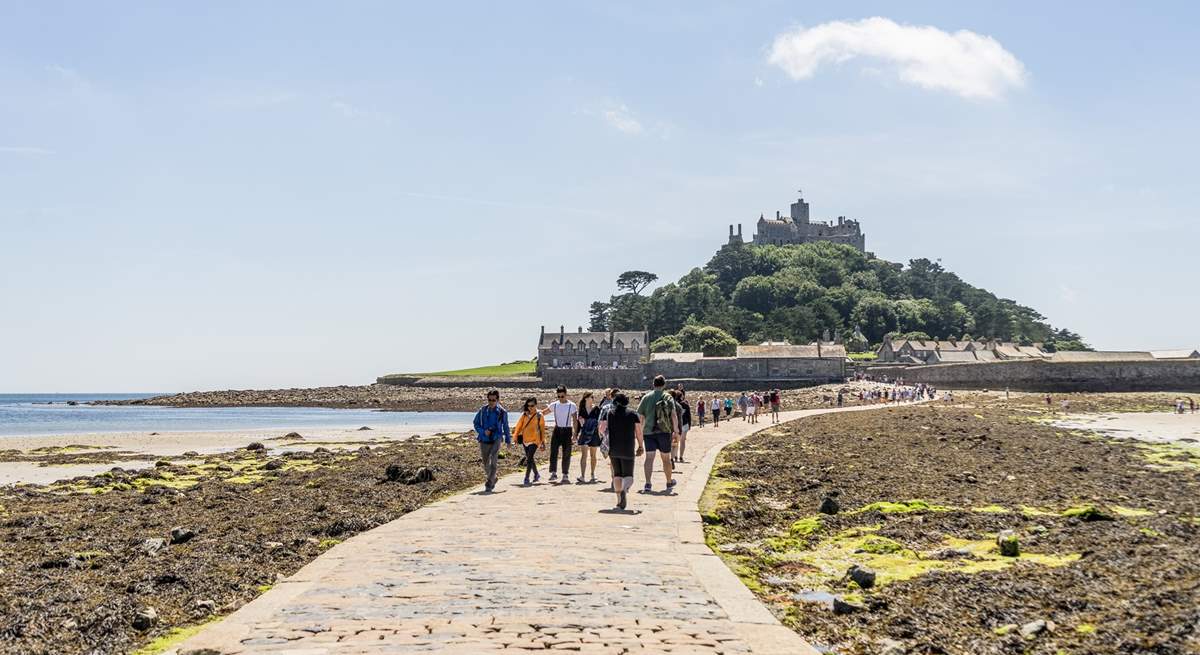 Walk along the causeway to St Michael's Mount at low tide and catch the ferry boat back when the tide is high.