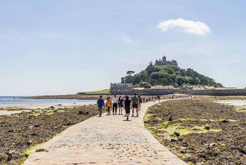Walk along the causeway to St Michael's Mount at low tide and catch the ferry boat back when the tide is high.