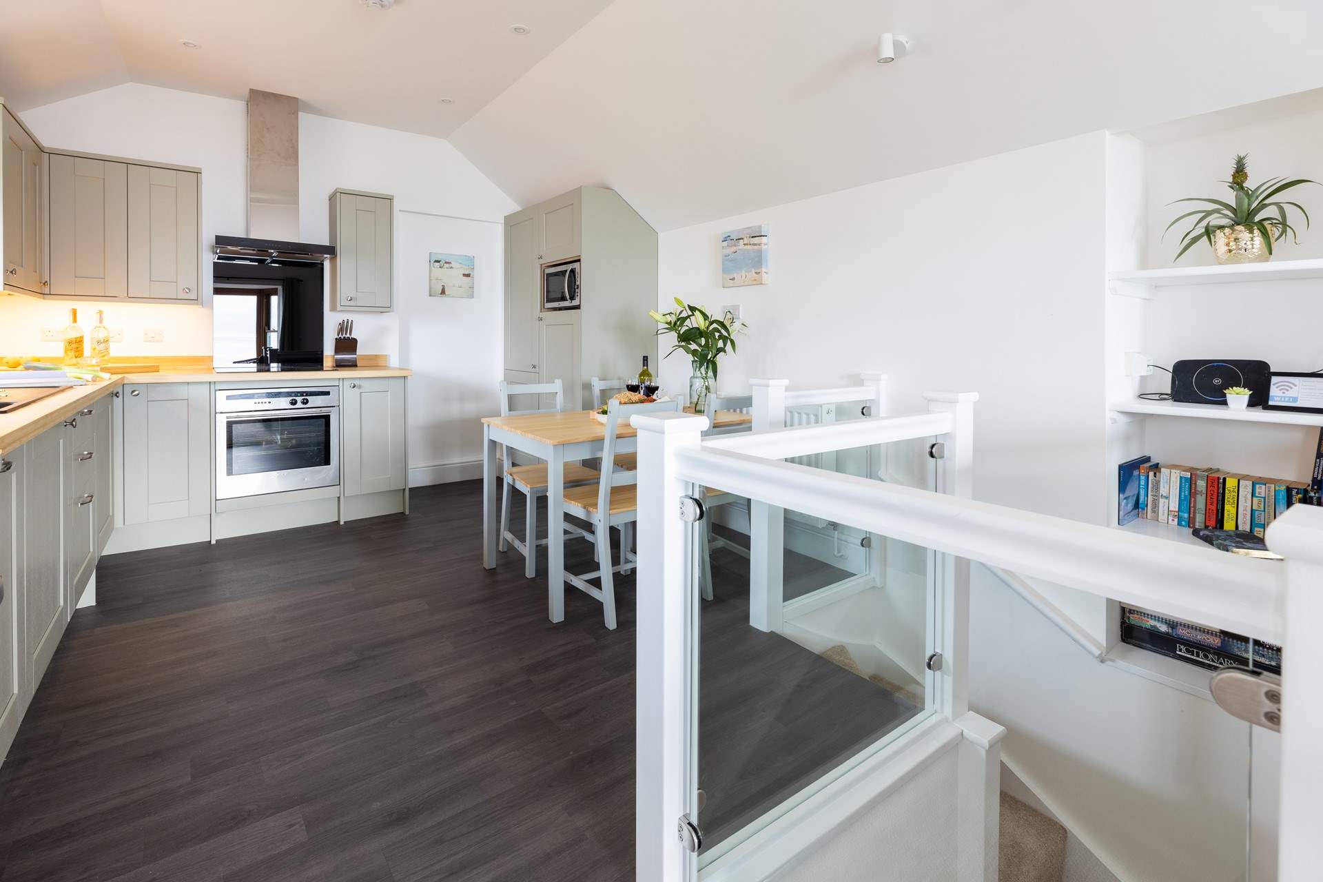 The stairs lead up from the ground floor bedrooms.