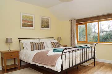 The romantic, large and spacious master bedroom boasts an en suite shower-room along with a 6' bed (Bedroom 1).