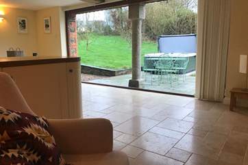 Enjoy the wonderful hot tub on the patio directly outside the barn.