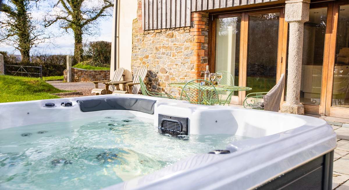 Enjoy the wonderful hot tub on the patio directly outside the barn.