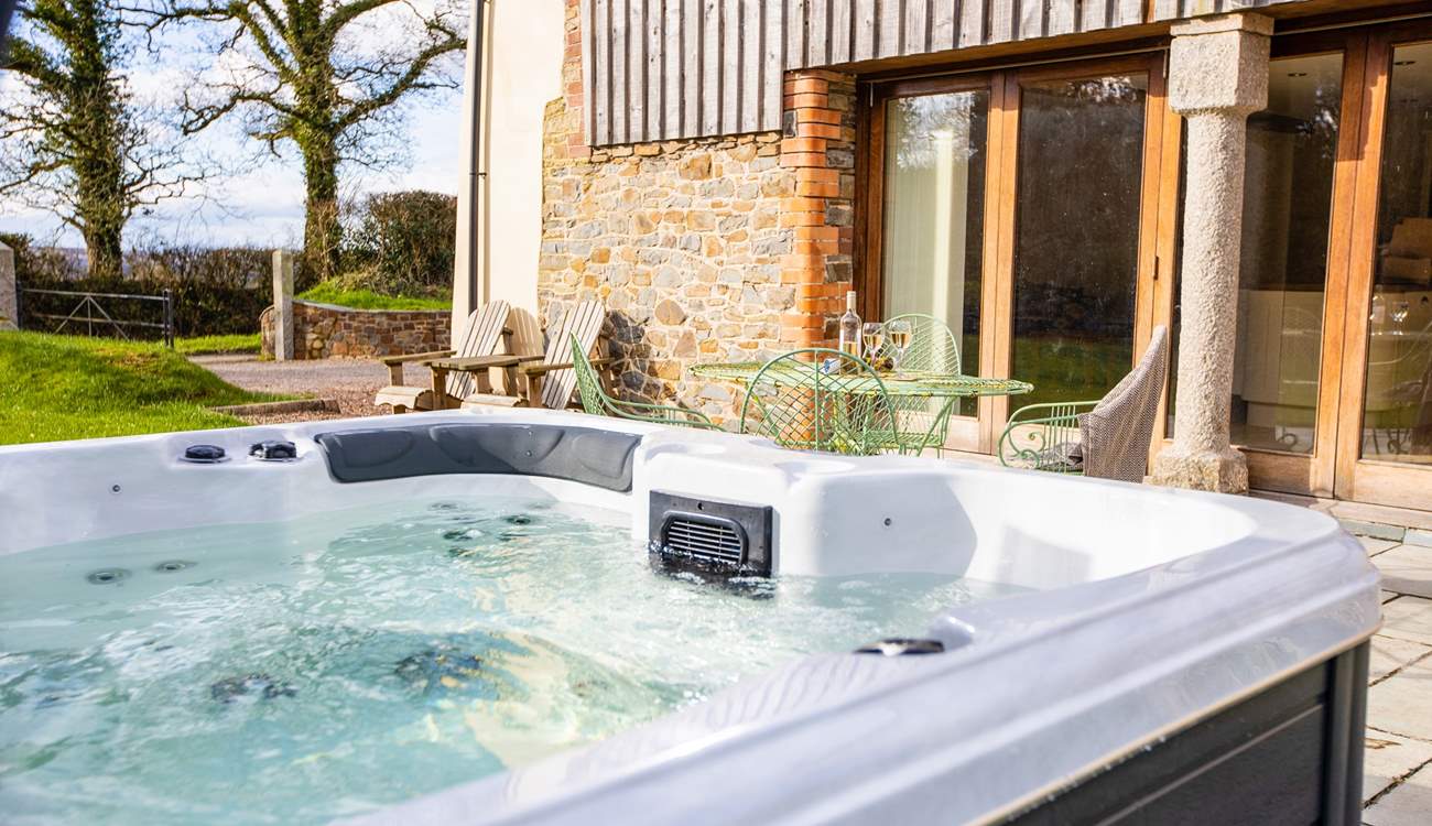 Enjoy the wonderful hot tub on the patio directly outside the barn.