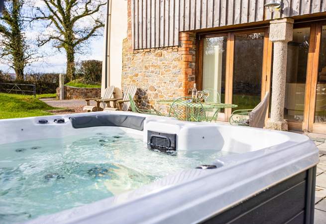 Enjoy the wonderful hot tub on the patio directly outside the barn.