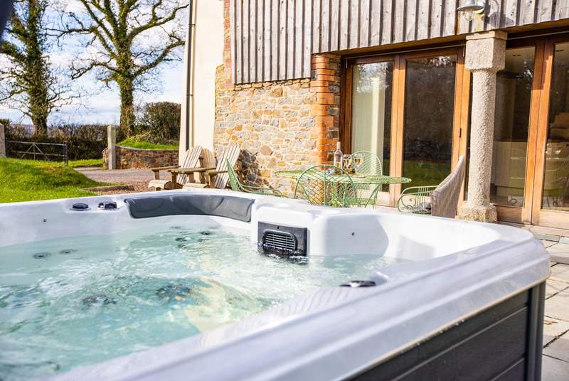 Enjoy the wonderful hot tub on the patio directly outside the barn.