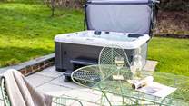 The hot tub on the patio invites you to relax and re-charge.