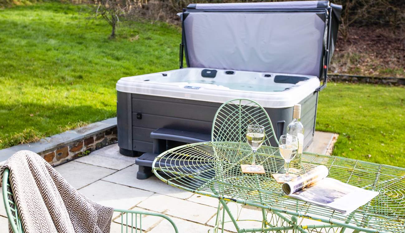 The hot tub on the patio invites you to relax and re-charge.