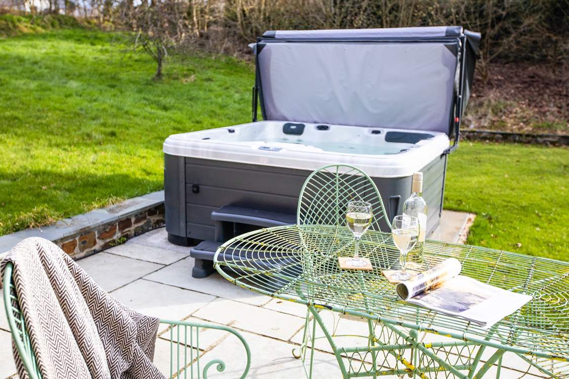 The hot tub on the patio invites you to relax and re-charge.