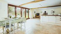 The light and airy kitchen diner has fabulous bi-fold doors.