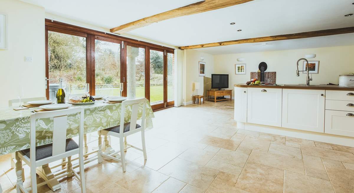 The light and airy kitchen diner has fabulous bi-fold doors.