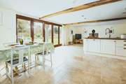 The light and airy kitchen diner has fabulous bi-fold doors.