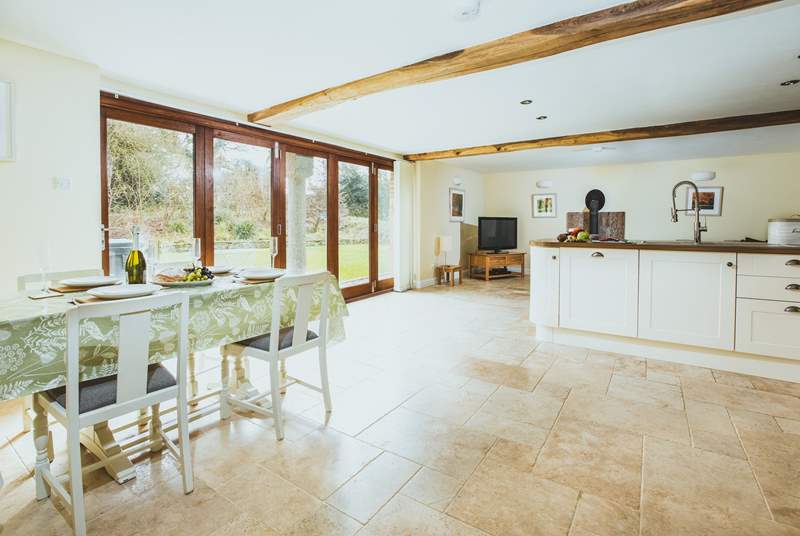 The light and airy kitchen diner has fabulous bi-fold doors.