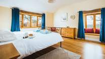 Bedroom 1 is a spacious room and boasts an en suite shower-room along with a 6' bed.