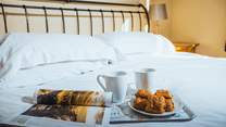 Luxury bed linens and breakfast in bed, perfect.