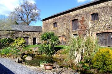 Storage barns opposite the cottages - the shared laundry-room is found in the left corner of the larger building.
