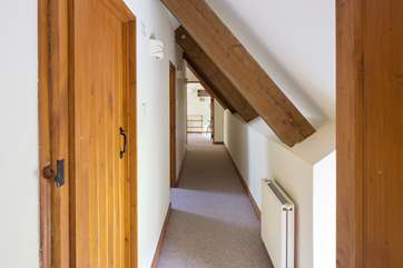 The first floor landing has a couple of low beams.