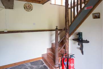The stairs up to the first floor.