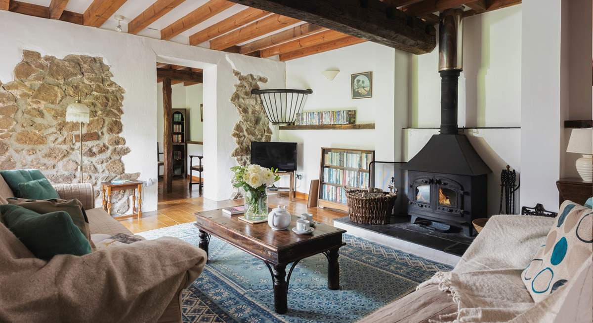 The cosy sitting-room with wood-burner.