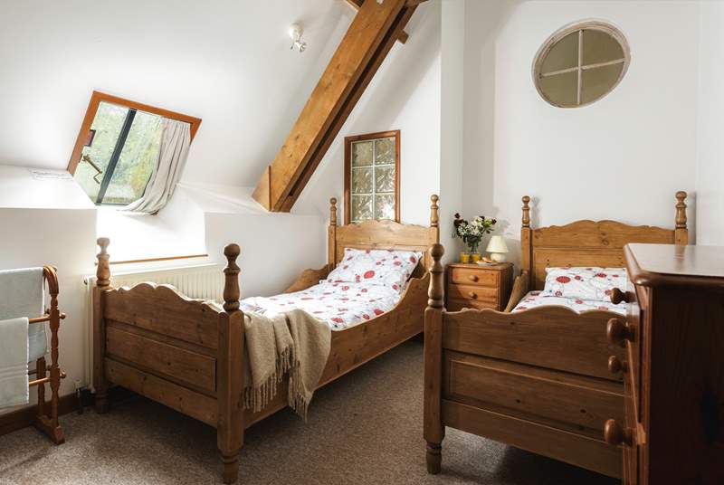 The delightful twin beds in bedroom 2.