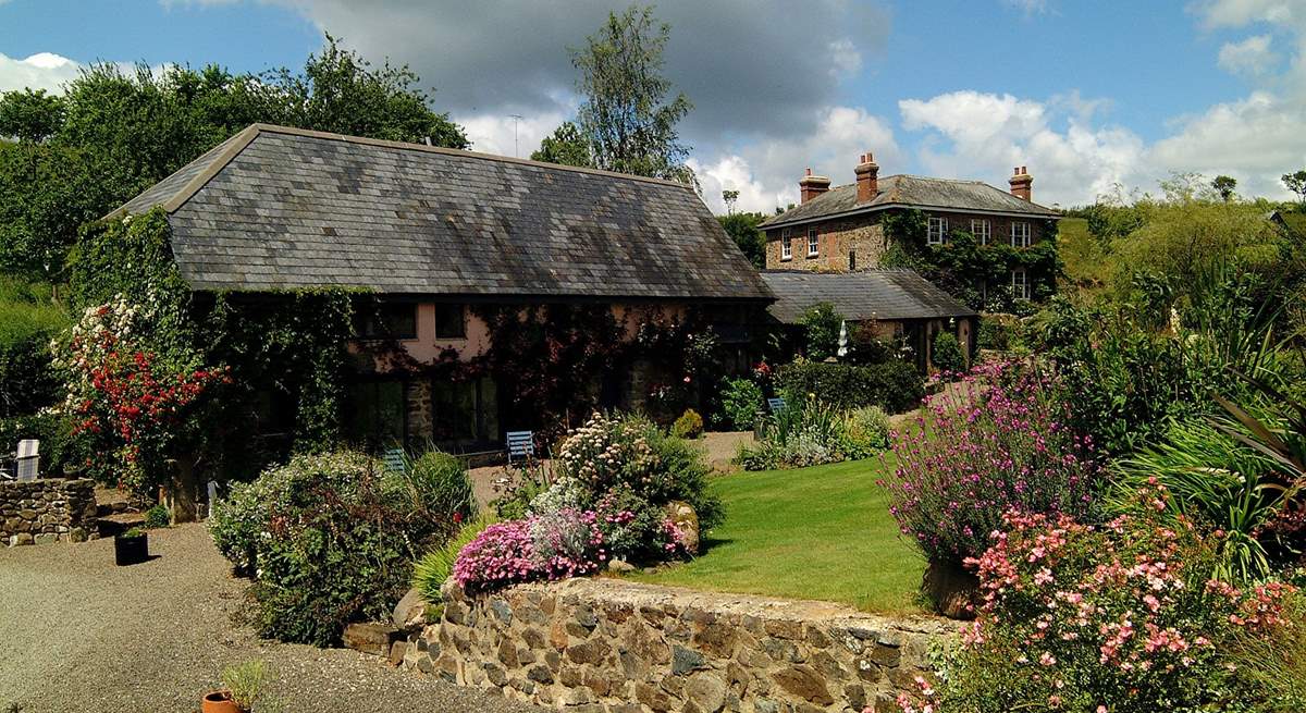 The grounds are full of bright flowers in the summer months.