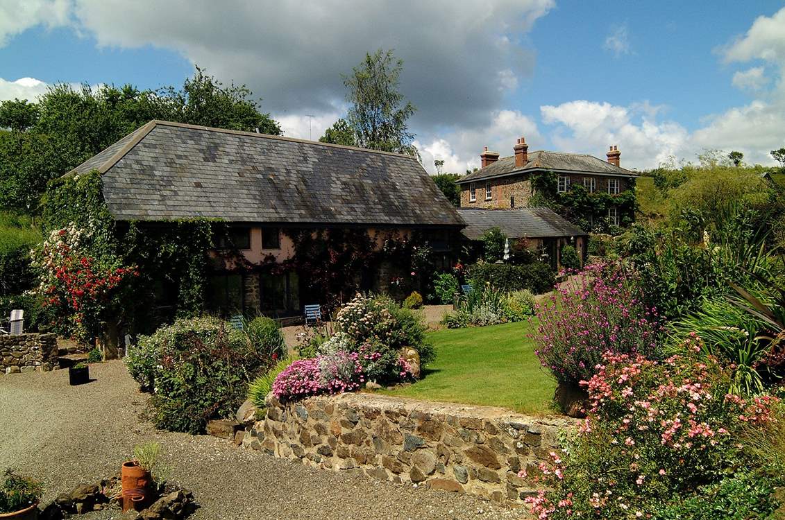 The grounds are full of bright flowers in the summer months.