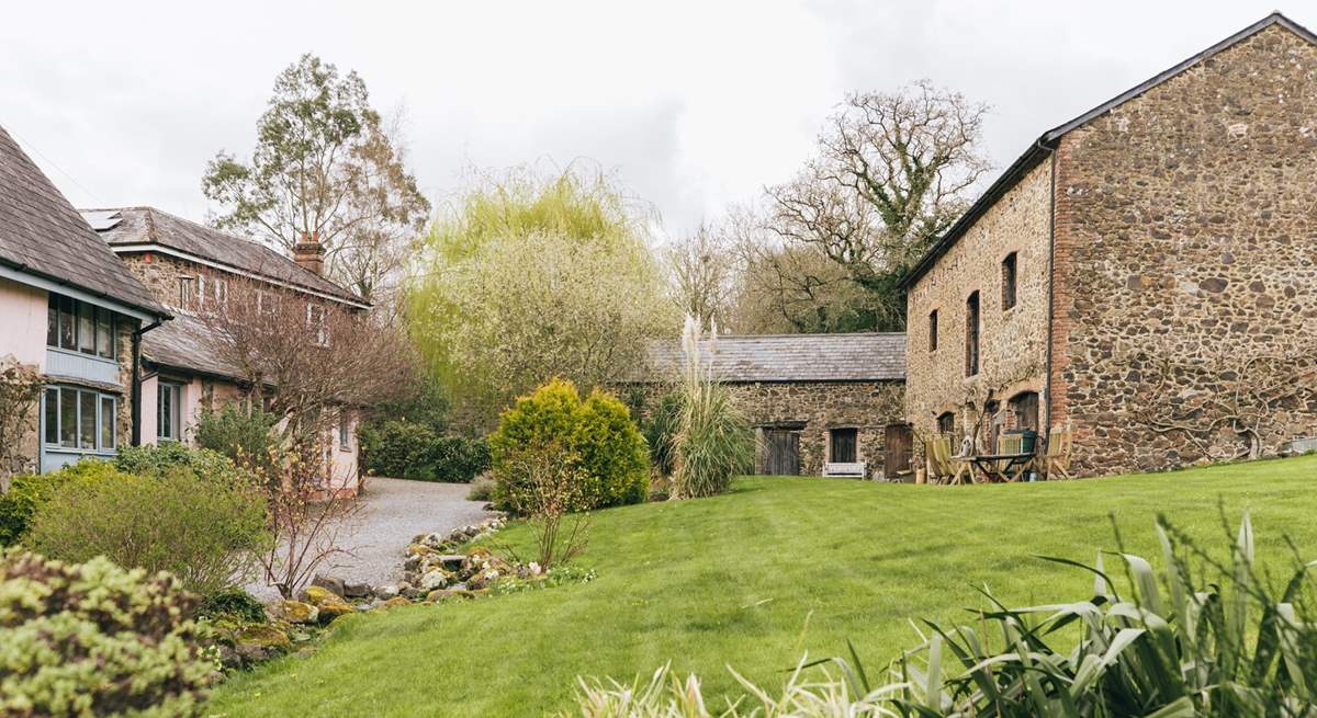 The Forge (single storey) is to the right of The Cob with the farmhouse behind - lived in by the owners.