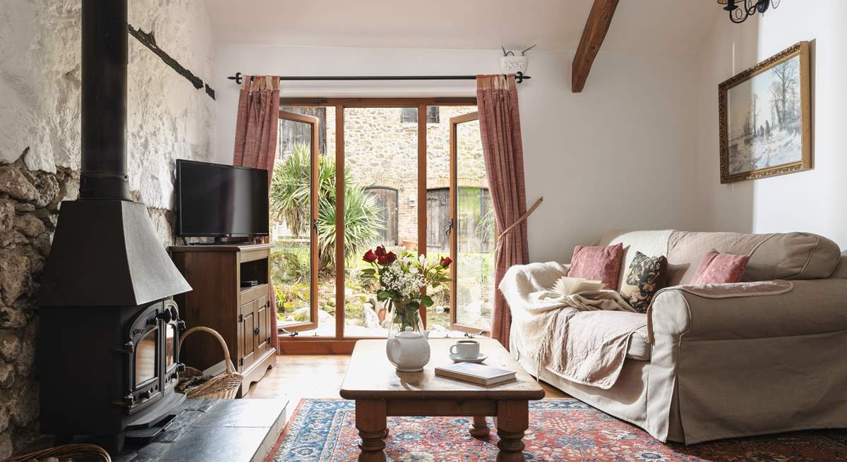 Snuggle up in the cosy sitting-room.