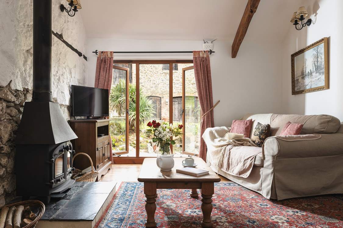 Snuggle up in the cosy sitting-room.