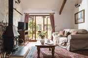 Snuggle up in the cosy sitting-room.