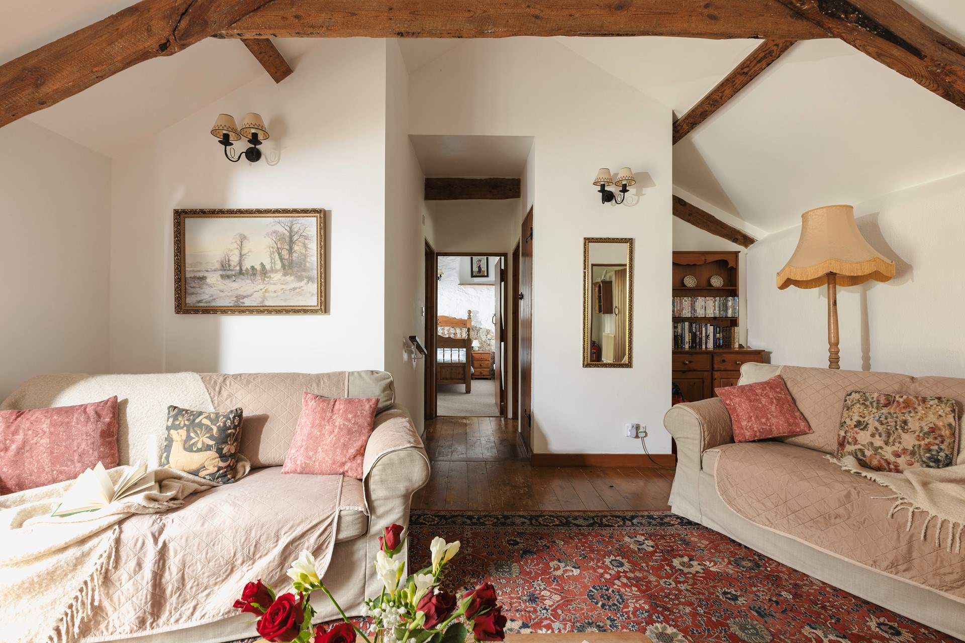 The sitting-room and bedroom 1 beyond.