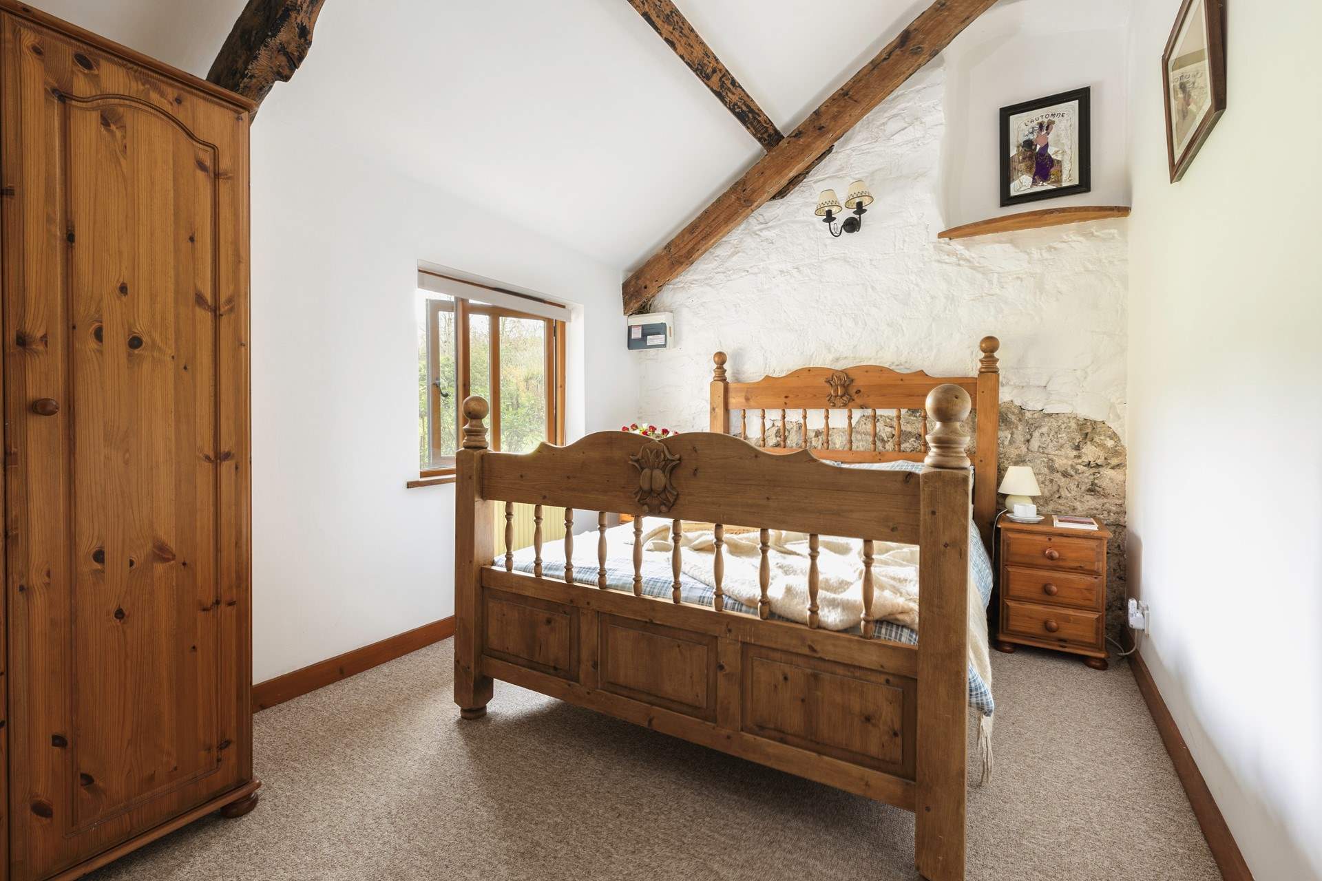 Bedroom 1 is a cosy double with original exposed beams.