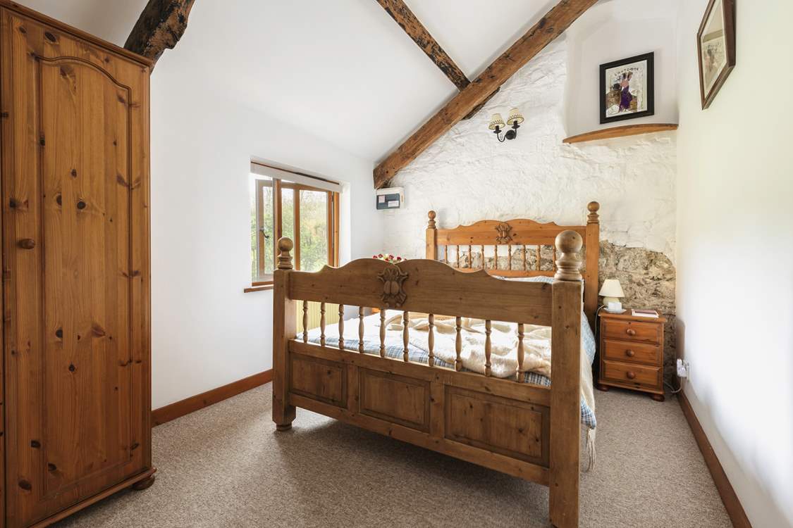 Bedroom 1 is a cosy double with original exposed beams.
