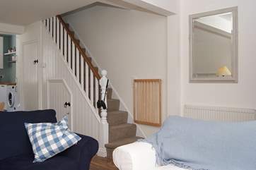 Stairs up from the living area.