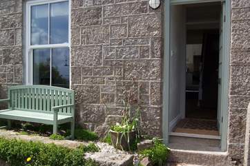 Relax in front of the cottage and take in the fabulous views.