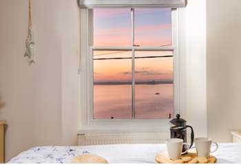 Sit back and enjoy the sunset from the comfort of your own bed.