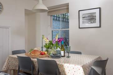 Enjoy delicious family meals around the large dinner table.