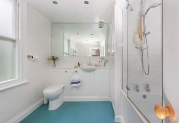 The large bathroom is the perfect place to unwind after a day on the beach.