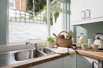 Take in the afternoon sun while washing up.